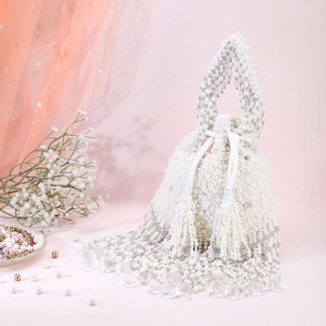 Shorya - pearl tassel potli
