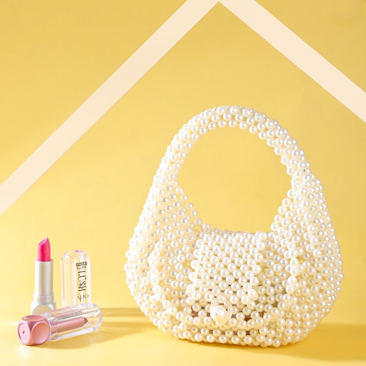 Pearl moon shape clutch